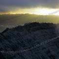 000199 Plerins sur le bord du volcan Bromo (Java, Indonsie). Photographie prise au moment du lever du soleil. A l'arrire plan, la caldeira du Tengger.
