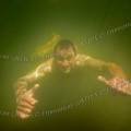 001153 Homme surgissant des eaux sombres de la rivire Ardche (Ardche (07), France).