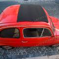 001466 FIAT 500 rouge en version ABARTH 595 (Lisbonne, Portugal). En 1963, le motoriste Carlo Abarth s'attaque  la version sport de la FIAT 500. La version de srie ne dpassant pas les 105 km/h, il permet avec cette 595 d'atteindre les 120 km/h.